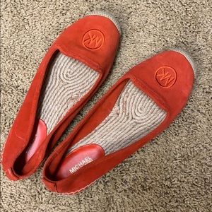 Michael Kors orange flats.